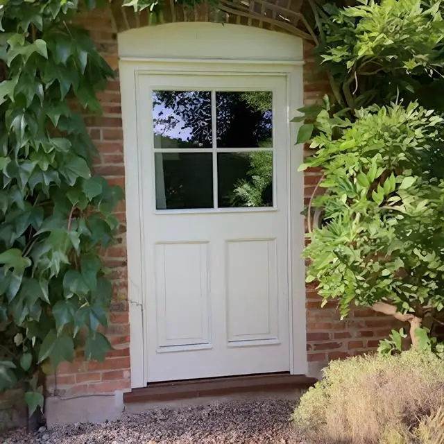 Cream panelled front door with glazed top lights